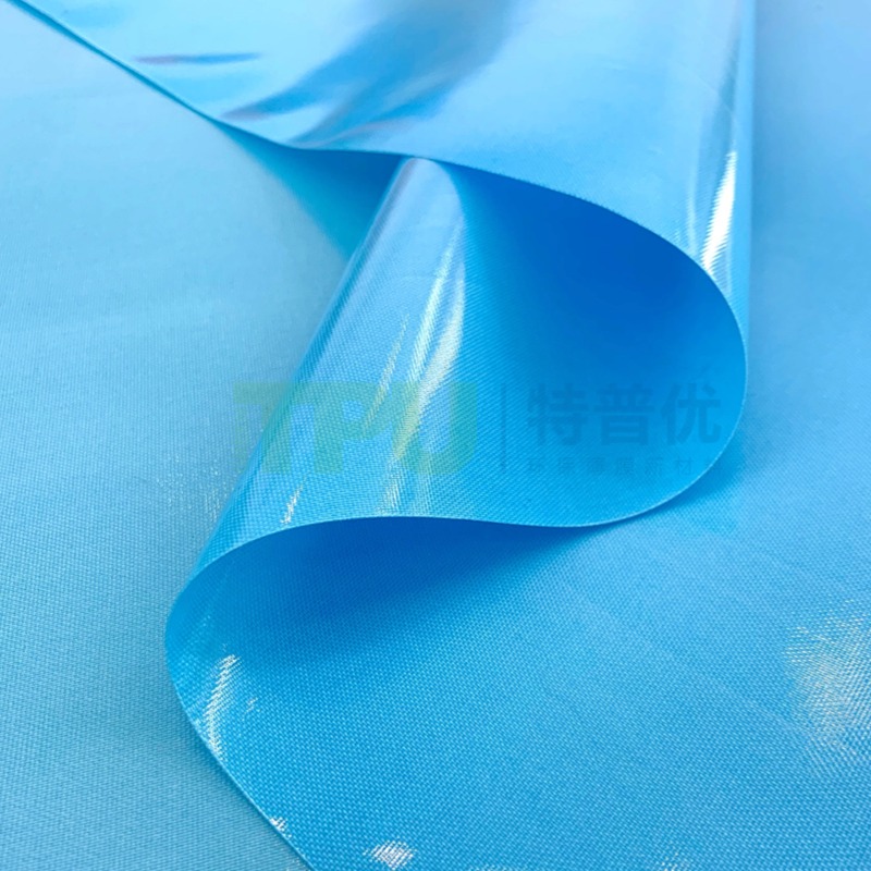 Blue TPU laminated PET fabric supplied by GREEN TPU providing strong flexible and durable material suitable for industrial and outdoor applications